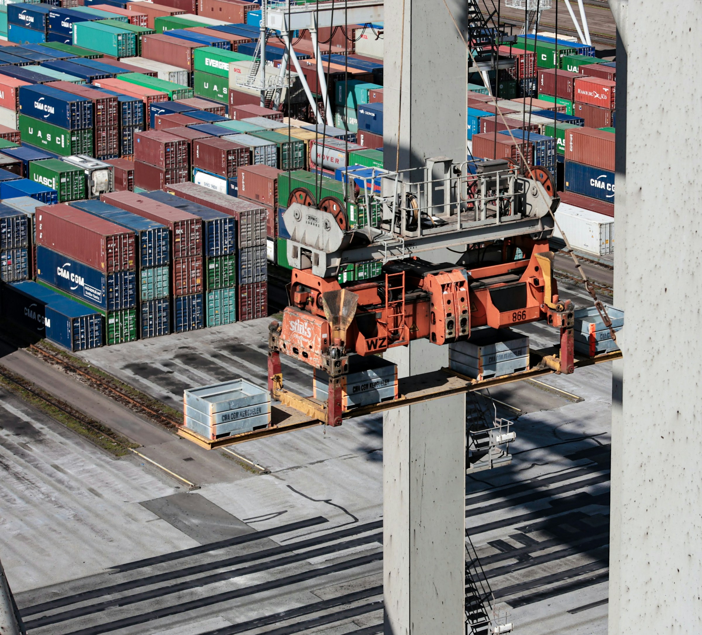 Overhead view of cargo containers and crane